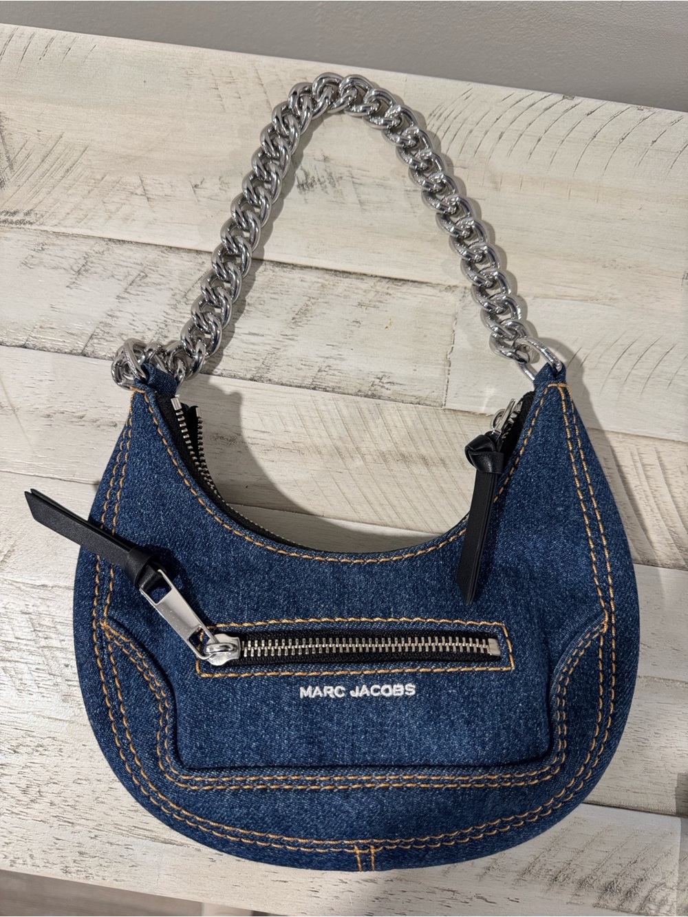 Marc Jacob’s Denim Cruiser Crescent Purse
